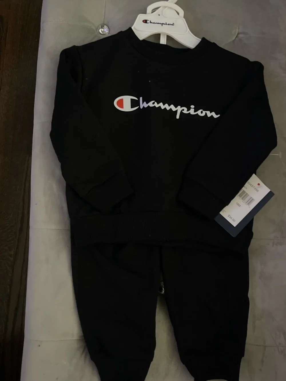 Champion Black Crewneck Sweatshirt with White Script and Red Accent